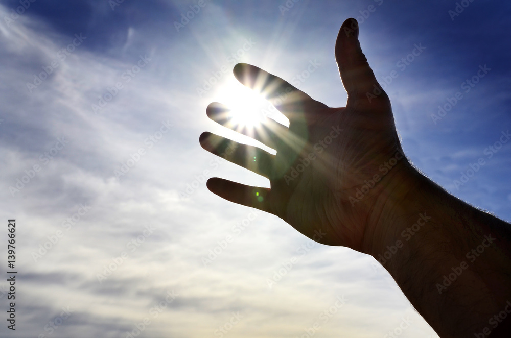Hand Reaching Towards the Light of Heaven Seeking Help Hand Reaching Towards the Light of Heaven Seeking Help
