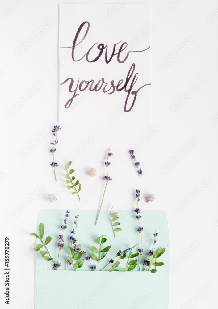 Fototapeta premium calligraphy floral pattern top view mock up