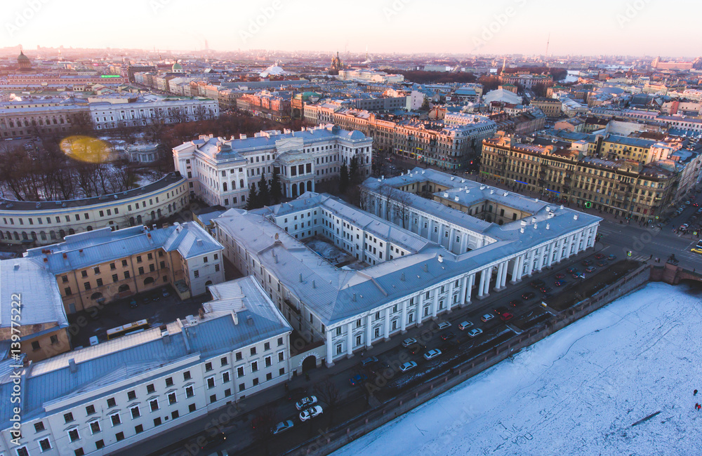 Obraz premium Beautiful super wide-angle summer aerial view of Saint-Petersburg, Russia with skyline and scenery beyond the city and Nevsky Prospect, seen from the quadrocopter air drone
