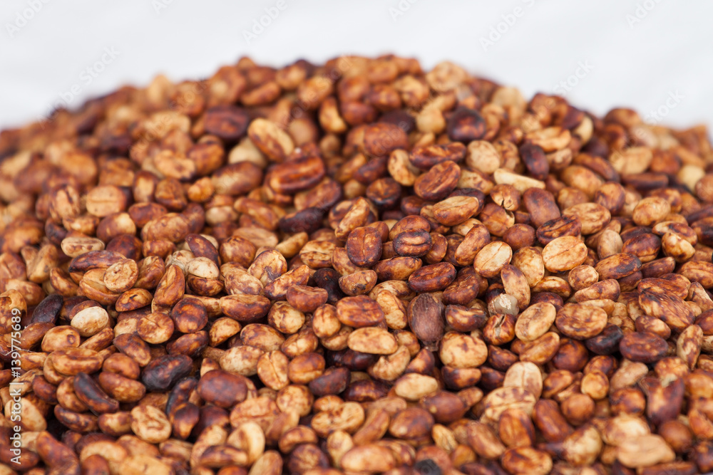 Fototapeta premium honey coffee beans also called 