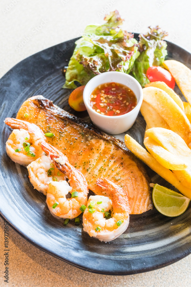 Grilled salmon and prawn steak Grilled salmon and prawn steak