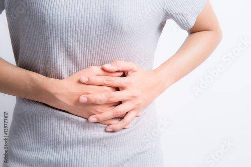 Wallpaper Mural asian woman having stomachache Torontodigital.ca