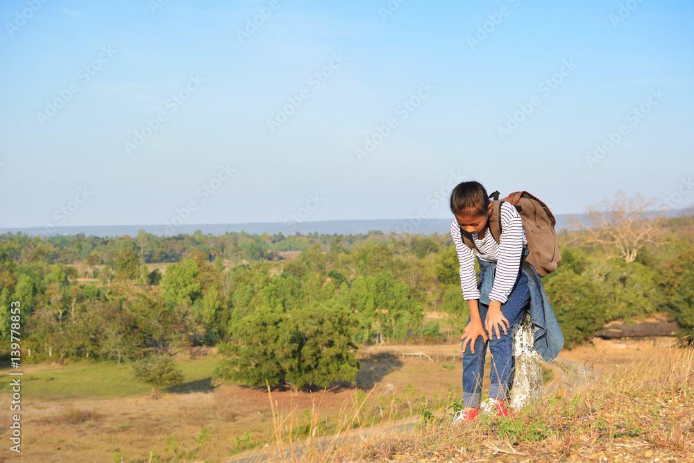 Happy Asian girl backpack  in nature background, Relax time on holiday concept travel ,color of vintage tone and soft focus