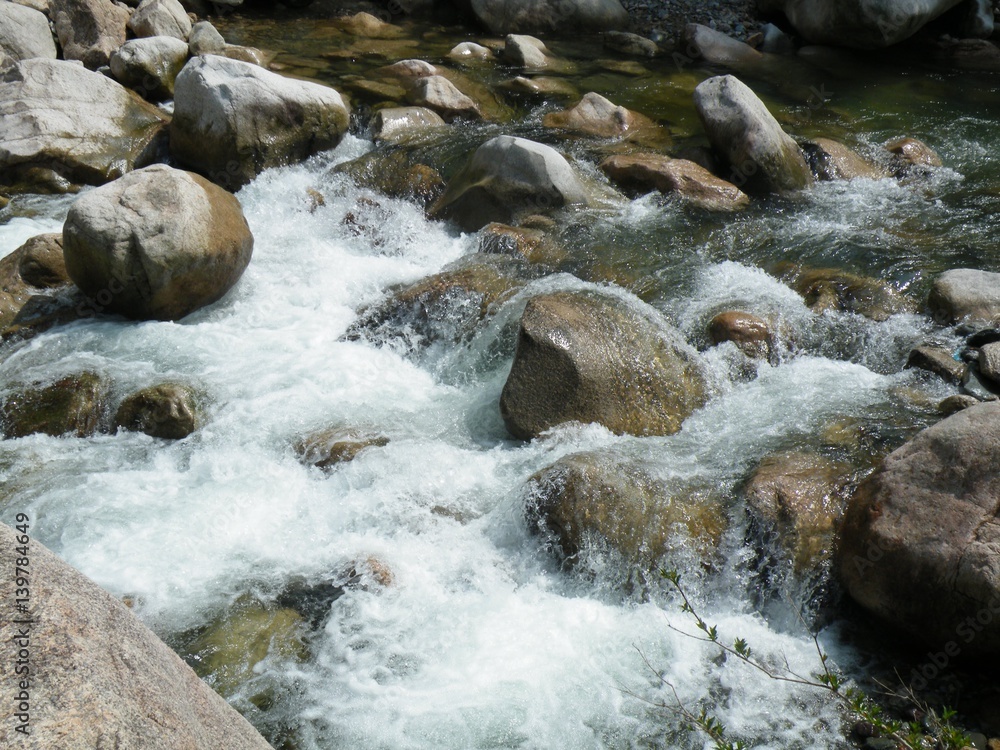 River flowing. Water stream and nature. River flowing. Water stream and nature.