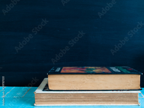 Blackboard and  books.  vintage 