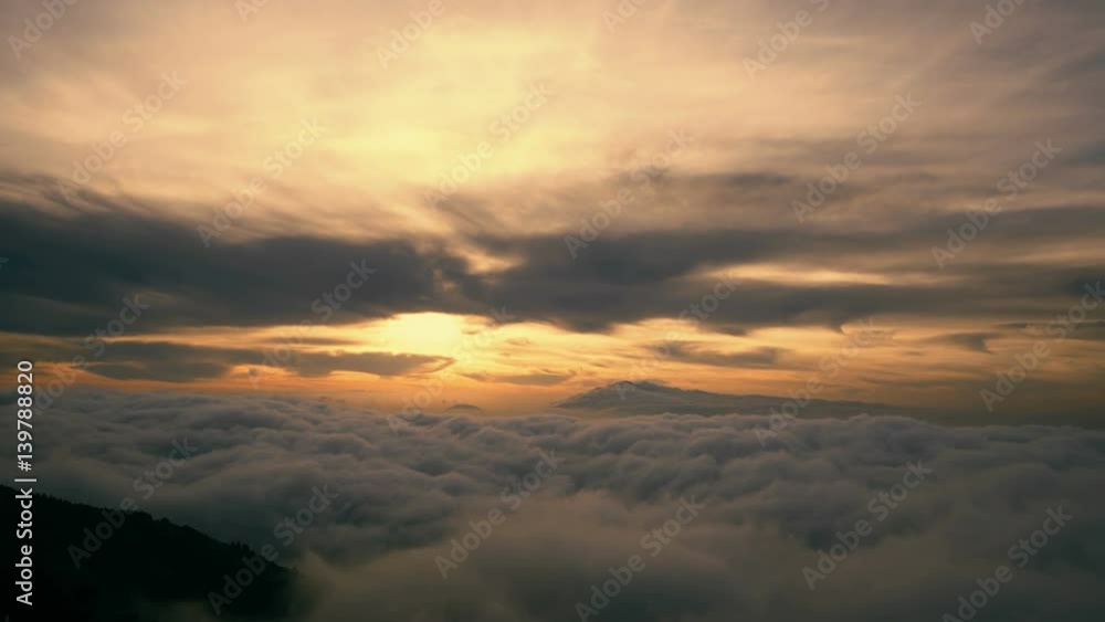 Breathtaking sunrise or sunset skyline view from the top of a mountain.Pov handheld gimbal stabilized shot of someone admiring a spectacular view from the top of a mountain during sunset or sunrise Breathtaking sunrise or sunset skyline view from the top of a mountain.Pov handheld gimbal stabilized shot of someone admiring a spectacular view from the top of a mountain during sunset or sunrise