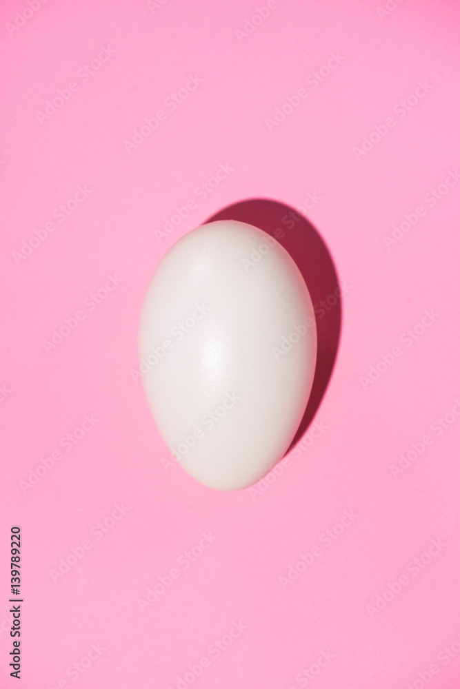 Top view of eggs on pink background Top view of eggs on pink background