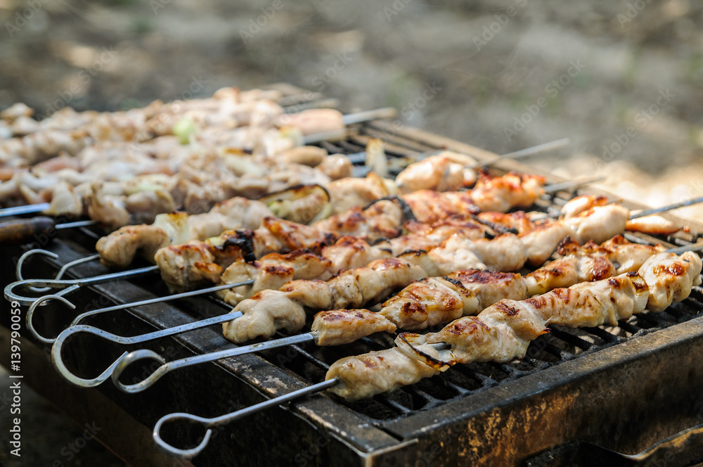 The Meat fried on the grill outdoor