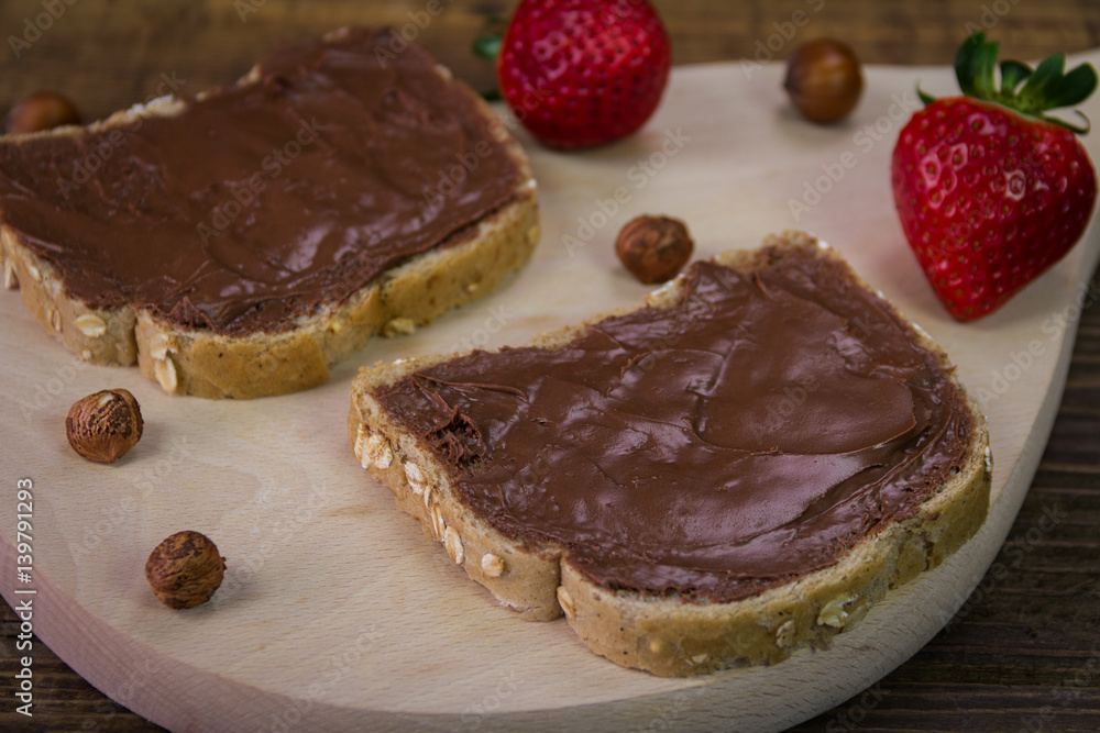 Bread with chocolate cream and strawberry Bread with chocolate cream and strawberry
