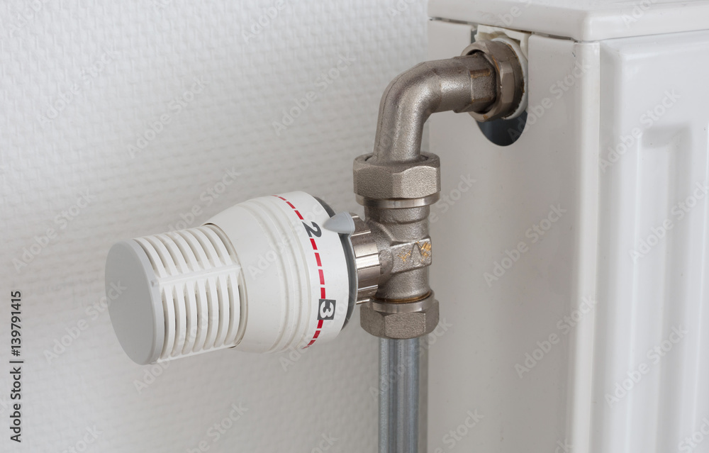 Temperature knob of heating radiator, used and dusty Temperature knob of heating radiator, used and dusty