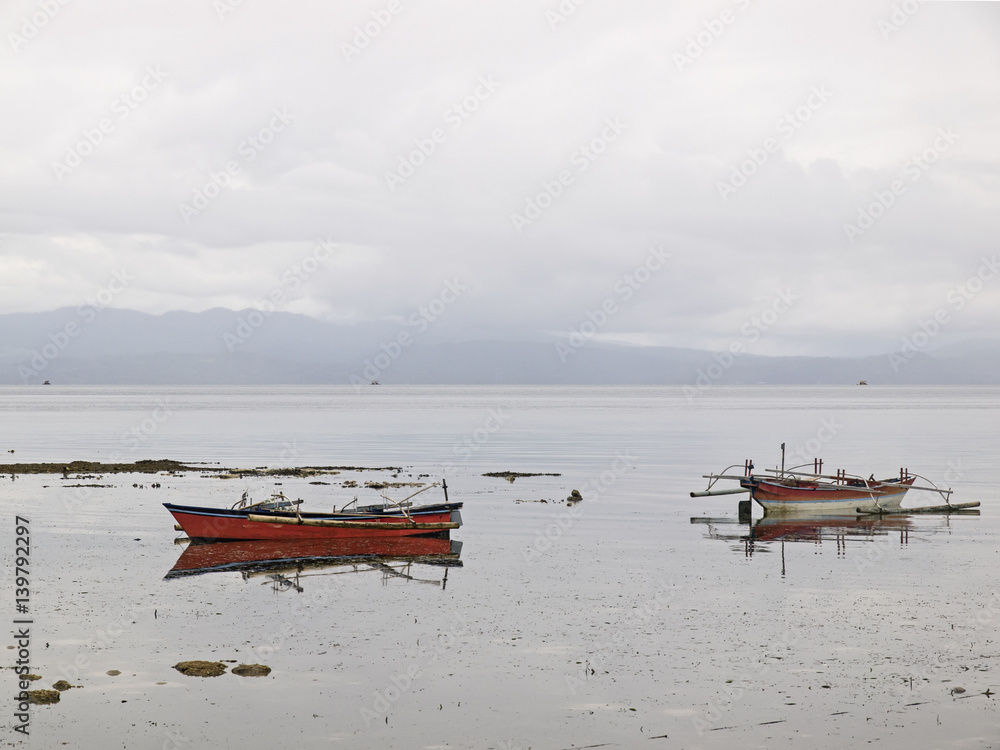 Indonesian fishing boats in the calm water