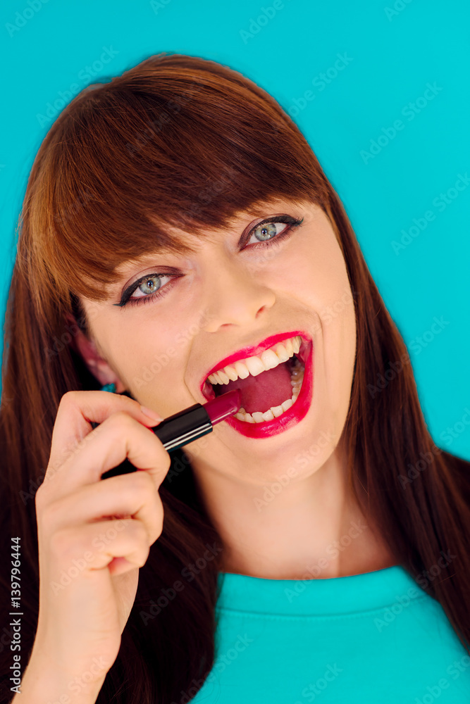 Beauty Girl Face with Colorful lips. Colourful Studio Shot of young Woman. Vivid Colors. Colourful fashion Makeup. Beautiful lady touching her face Beauty Girl Face with Colorful lips. Colourful Studio Shot of young Woman. Vivid Colors. Colourful fashion Makeup. Beautiful lady touching her face
