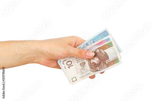 Few zloty in the woman's hand, isolated