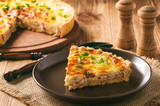 Traditional french pie with bacon and cheese - quiche lorraine.