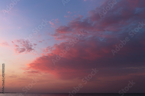 Red sunrise on Black Sea. Horizon and sea © Makkuro_GL
