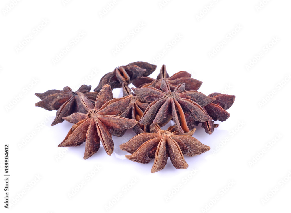 Star anise spice fruits and seeds isolated on white background closeup Star anise spice fruits and seeds isolated on white background closeup