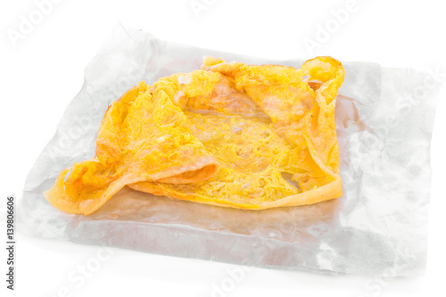 Indian bread roti put egg in paper on white background