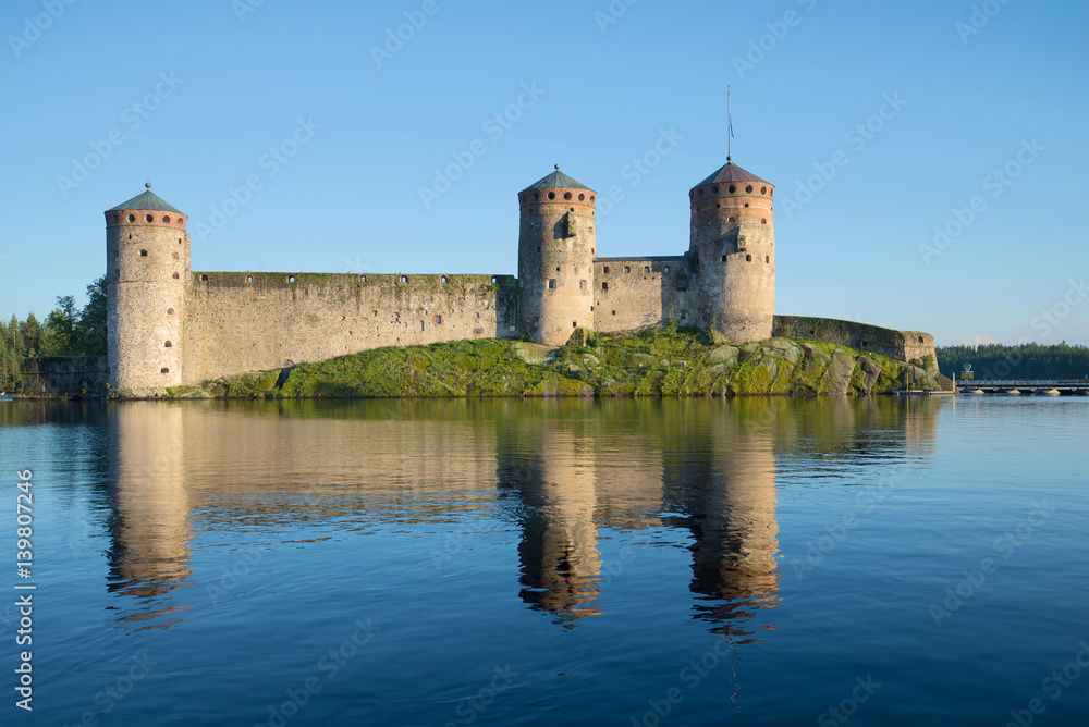 View of the medieval Olavinlinna fortress in the August evening. Savonlinna, Finland
