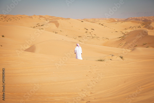 local man in middle eastern desert