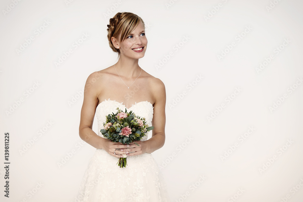 Stunningly beautiful bride against white background Stunningly beautiful bride against white background