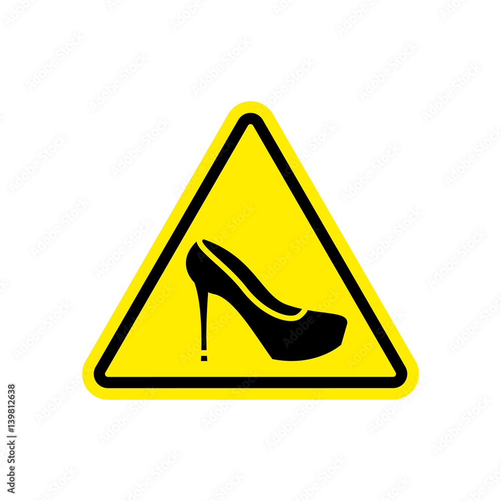 Attention woman. yellow prohibitory road sign women's shoes. Attention woman. yellow prohibitory road sign women's shoes.