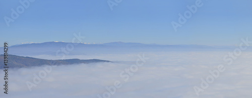 Panorama of fog and cloud mountain valley landscape. misty forest in the morning © zefart