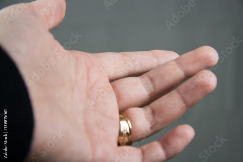 Hand with golden ring