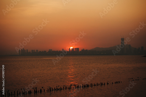 Sunset over Shenzhen bay; city of Sheznhen, Guangdong province, People's Republic of China photo