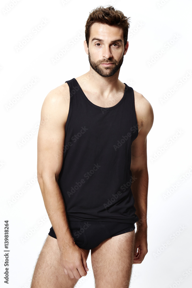 Portrait of man in black underwear, studio Portrait of man in black underwear, studio
