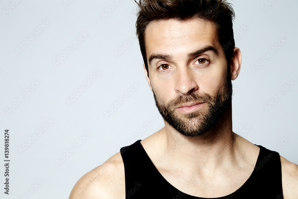Stubble guy in vest, portrait Stubble guy in vest, portrait