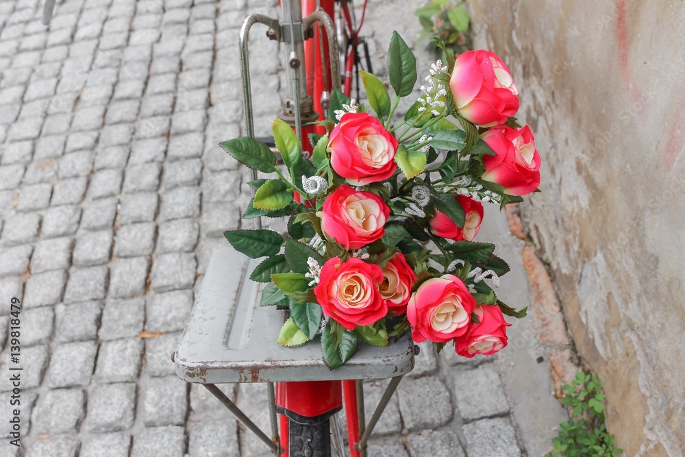 flower and drop of water on red bicycle classic vintage with copy space for add text flower and drop of water on red bicycle classic vintage with copy space for add text