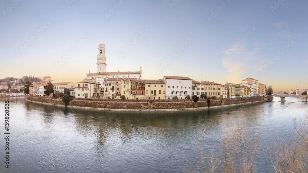 historical quarter of Verona, panorama from river on Duomo Cathedral at sunrise. Creative toning effect