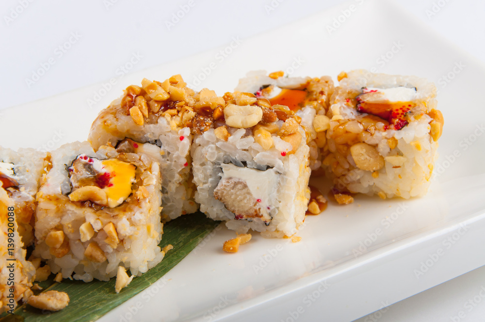sushi roll with tuna, Philadelphia cheese, flying fish caviar, peanuts sushi roll with tuna, Philadelphia cheese, flying fish caviar, peanuts