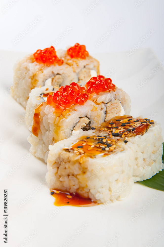 sushi roll with tuna, scrambled eggs, cream cheese and red caviar sushi roll with tuna, scrambled eggs, cream cheese and red caviar