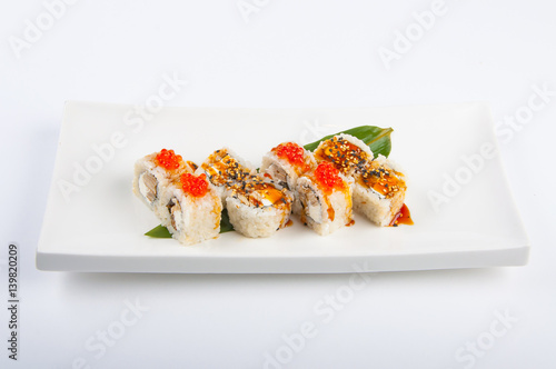 sushi roll with tuna, scrambled eggs, cream cheese and red caviar