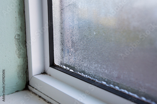 House Window With Damp And Condensation photo