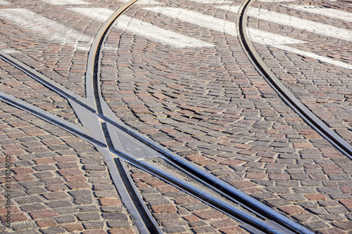 close up of tram tracks crossing each other