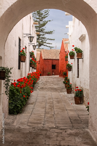 View through an arch to typical street and buildings in historic Santa Catalina Monastery, Arequipa, Peru © Uwe Bergwitz