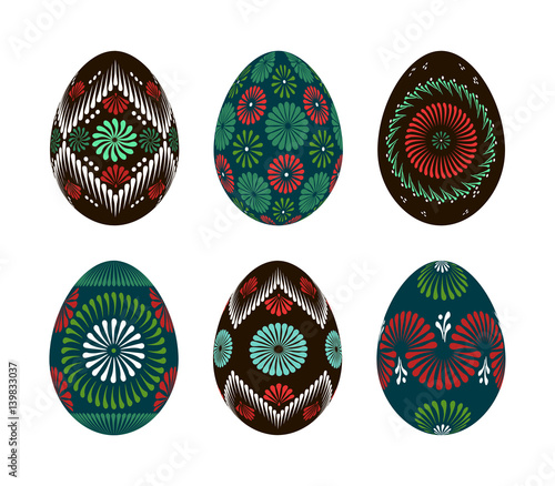 Set of traditional Easter eggs. Hand painted eggs using hot wax technique illustration in green red and blue.