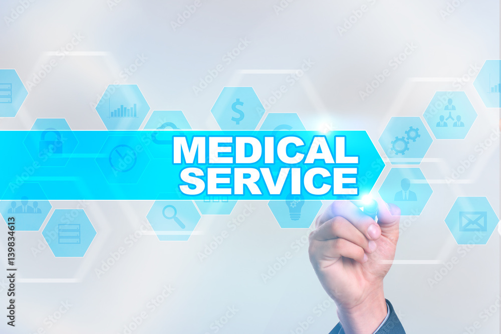 Medical doctor drawing medical service on the virtual screen. Medical doctor drawing medical service on the virtual screen.