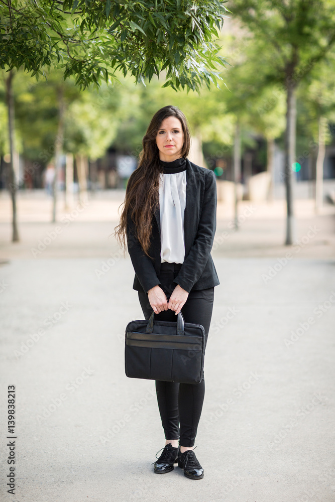 Fototapeta premium Serious woman wearing formal clothes