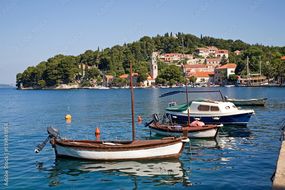 Seaside village of Cavtat with fishing boats in the harbor