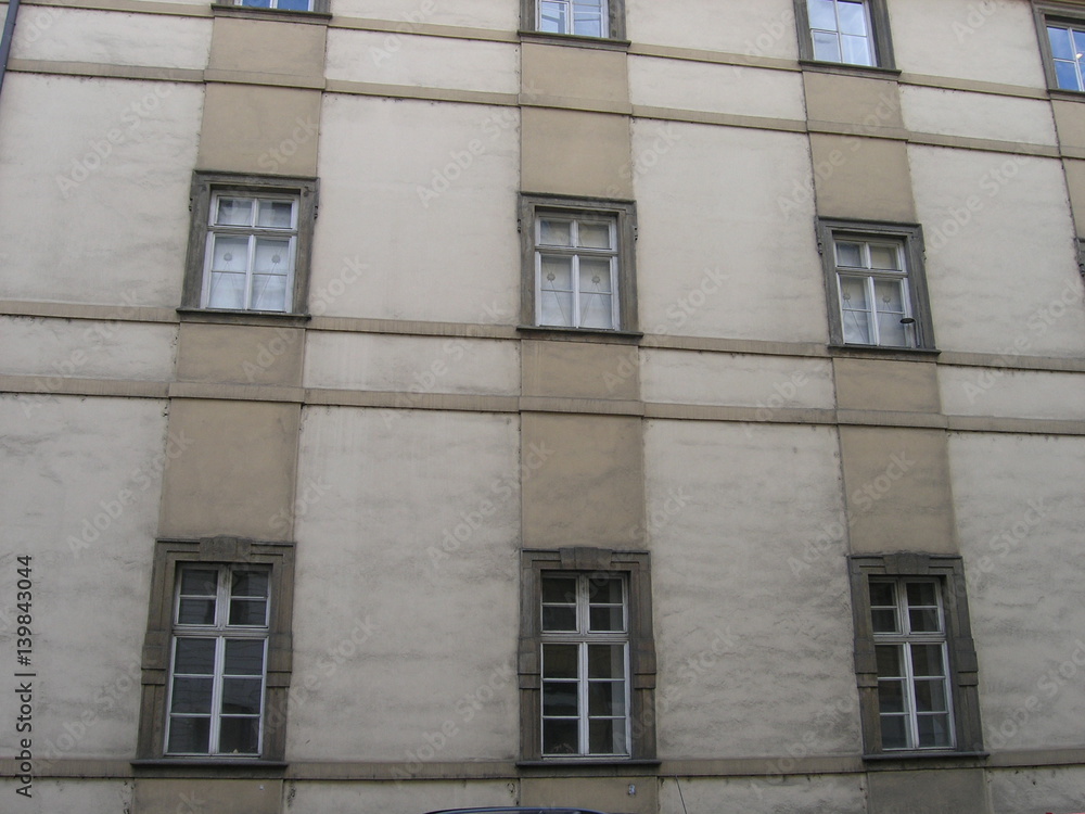 windows square patern on an old facade