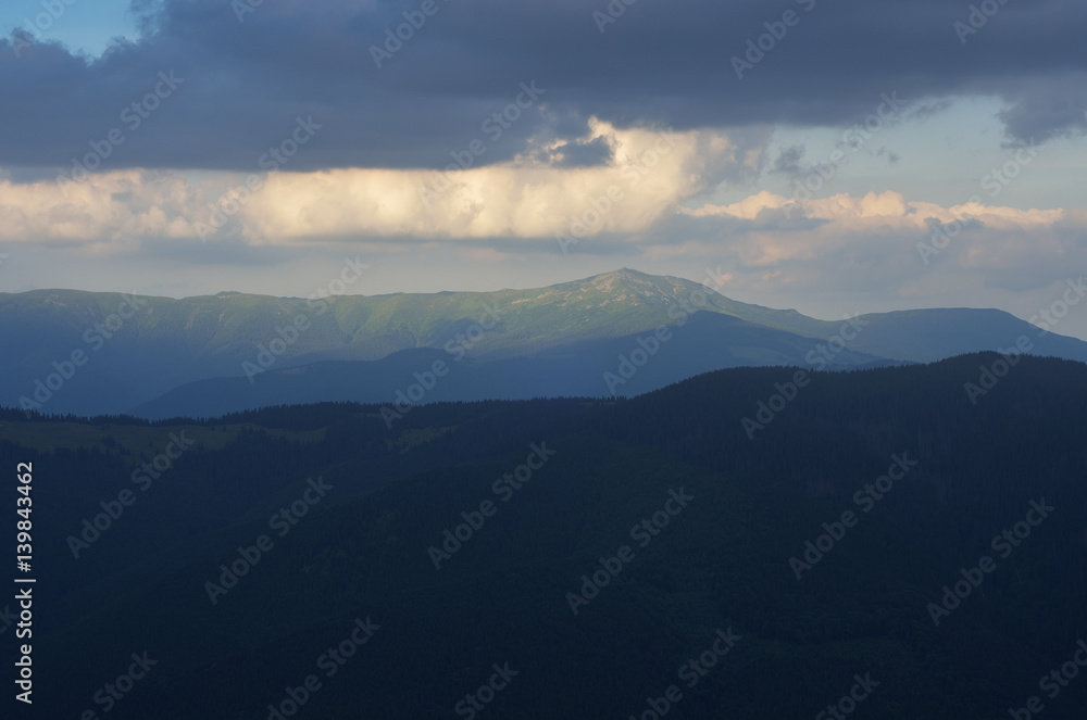 Evening landscape with a mountain peak