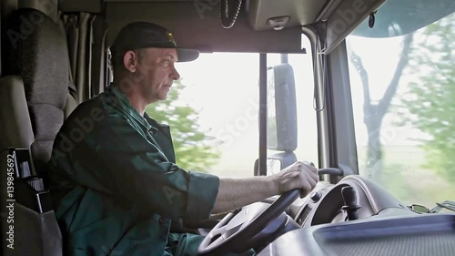 Truck Driver in the Car Delivery Service.