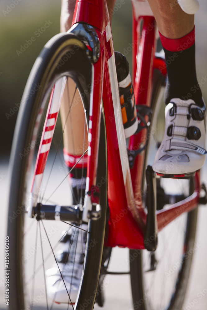 Cyclist riding a bike in a cycling race. Racing Bike. Cyclist riding a bike in a cycling race. Racing Bike.