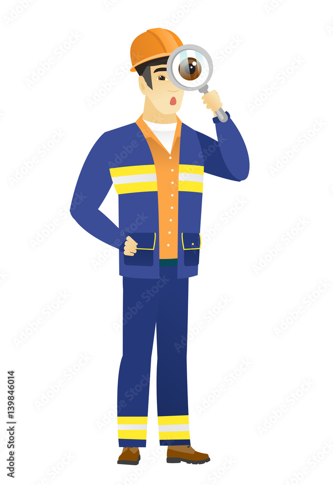 Asian builder with magnifying glass. Asian builder with magnifying glass.