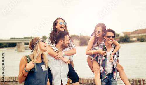 Happy young people attending festivals at summer