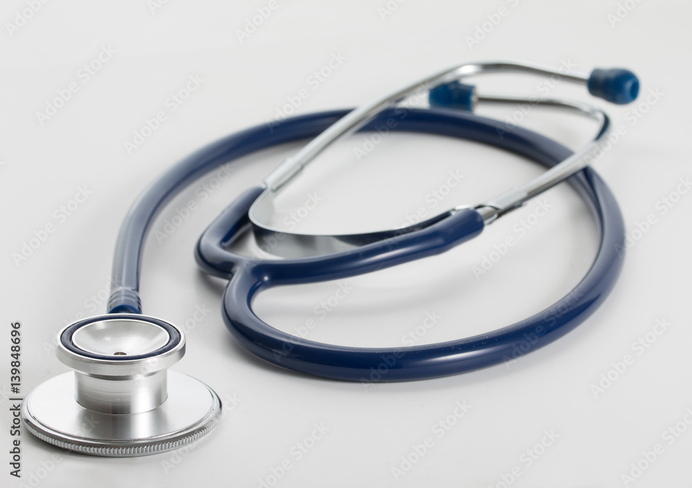 Blue medical stethoscope on grey background Blue medical stethoscope on grey background