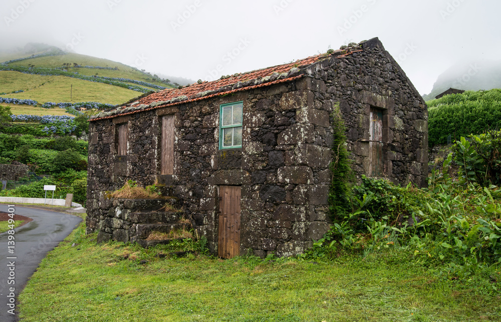 Typical stone residence house on Azores island Typical stone residence house on Azores island